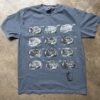 Blue-grey tee hand printed with twelve curled opossums in rows